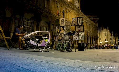 Миланский уличный художник ждет туристов. / Photo: Patrizio Scorzeni